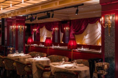 A view of Park Chinois Chinese restaurant dining space with a shanghai décor